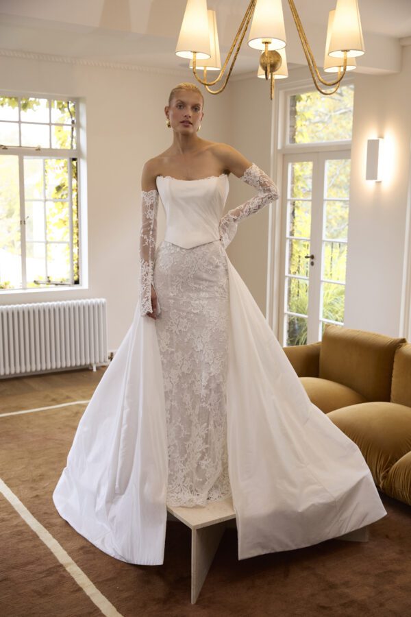 La Premiere Bobbi Wedding Dress - Fit and flare modern-classic dress with Basque waist, petal shaped neckline, detachable train and sleeves. 