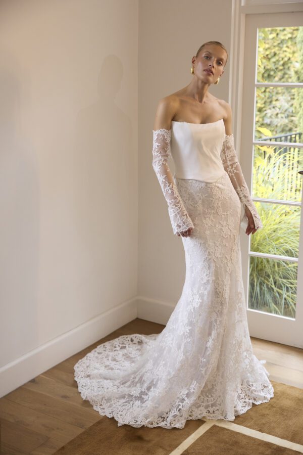 La Premiere Bobbi Wedding Dress - Fit and flare modern-classic dress with Basque waist, petal shaped neckline, detachable train and sleeves. 