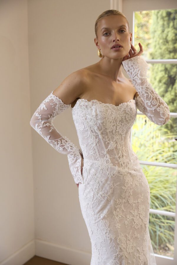 La Premiere Bobbi Wedding Dress - Fit and flare modern-classic dress with Basque waist, petal shaped neckline, detachable train and sleeves. 