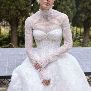 La Premiere Brooke Wedding Dress - Ballgown style dress with sweetheart neckline illusion long sleeves, Basque waistline, corset and, voluminous skirt.