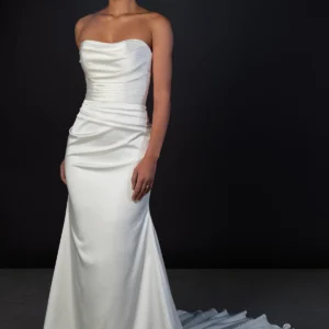 Martina Liana 1874 Wedding Dress - Modern dress with a strapless bodice, detachable long sleeve lace topper, lace train, and ruched detail at the back.