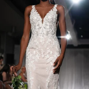 Martina Liana 1908 Wedding Dress - Fit and flare with 3D floral embellishments, V-neckline, 3D floral straps, side cutouts, open back, and skirt with lace appliqués.