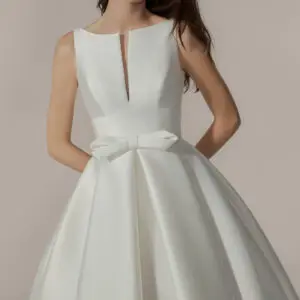 Jesus Peiro IC-05 Wedding Dress - Romantic Bridal Dress with Natural Waist, High Neckline, V-Neck, Open V-Back, Bow Detail and Pockets. 