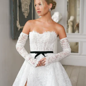 La Premiere Anna Wedding Dress - Romantic, Sexy A-Line Bridal Gown with Natural Waist, Sweetheart Strapless Neckline, Detachable Long Sleeves, Corset Detail, and Lace Fabric.