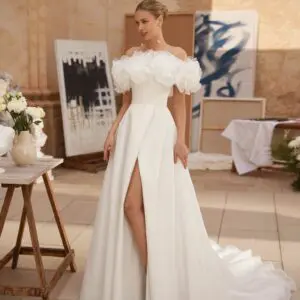 Rosa Clara Micaela Wedding Dress - Romantic, Beach Boho A-Line Bridal Gown with Natural Waist, Straight Neckline, Puff Off the Shoulder Sleeves, Draping and Slit Detail in Organza Fabric.