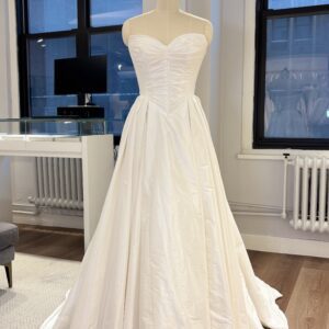 La Premiere Blake Wedding Dress - Classic Modern A-Line Bridal Gown with Basque Waist, Sweetheart Neckline, Cat-Eye, Detachable Sleeves, Pleated Detail and Taffeta Fabric.